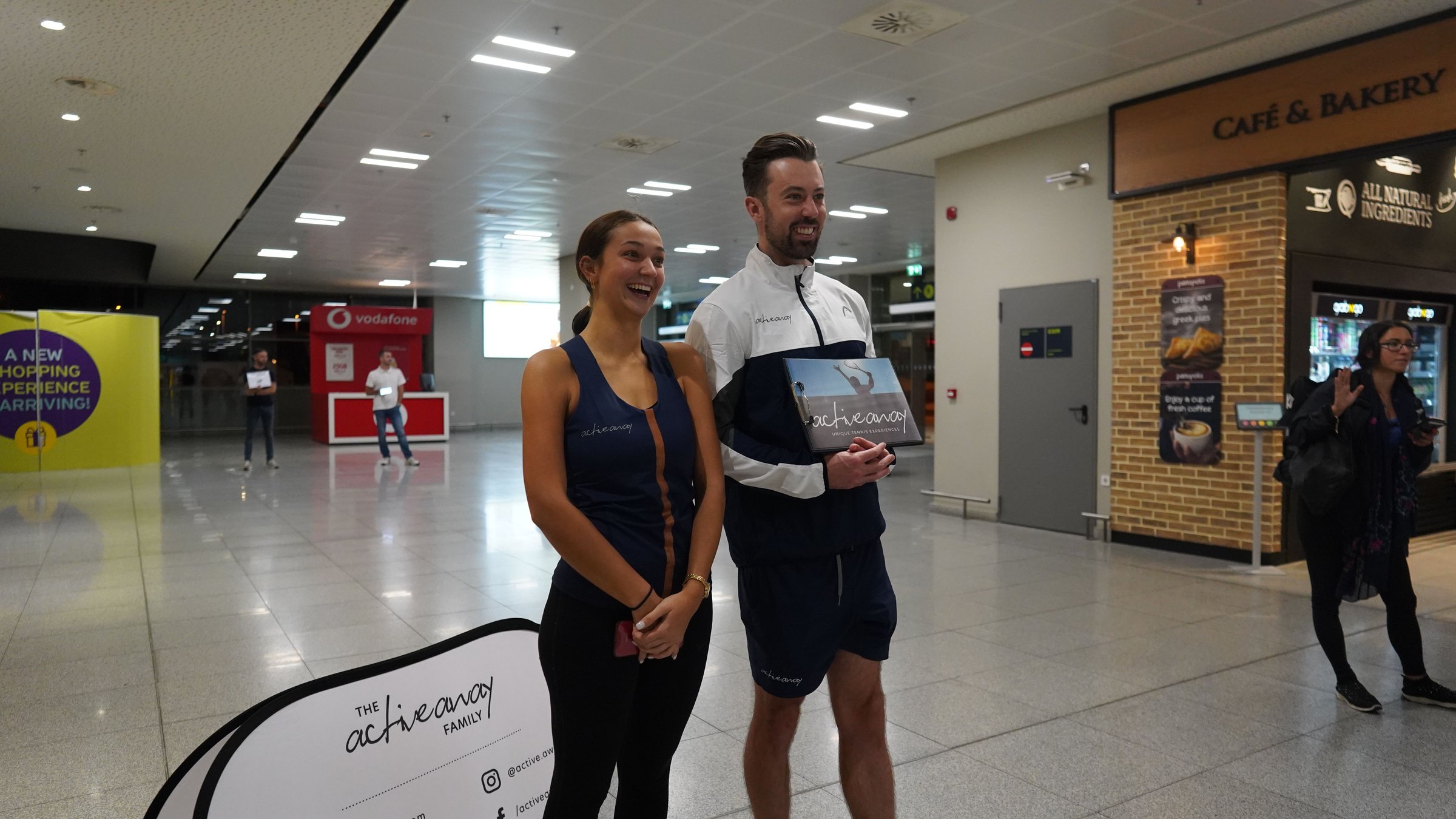 Active Away team members welcoming guests at airport arrivals before their racket-sports holiday