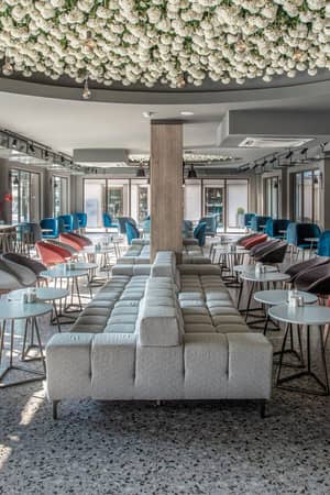 Contemporary lounge seating inside the Bistro at Paloma Orenda