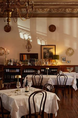Historic Hotel Monterosa dining room set for dinner