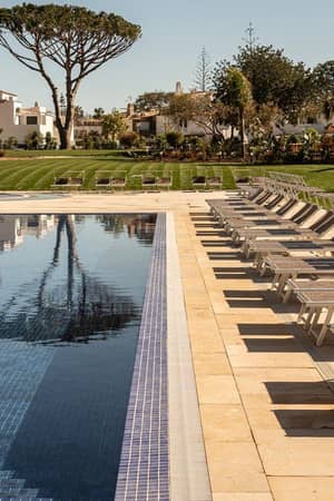 Outdoor swimming pool and sun terrace at the hotel