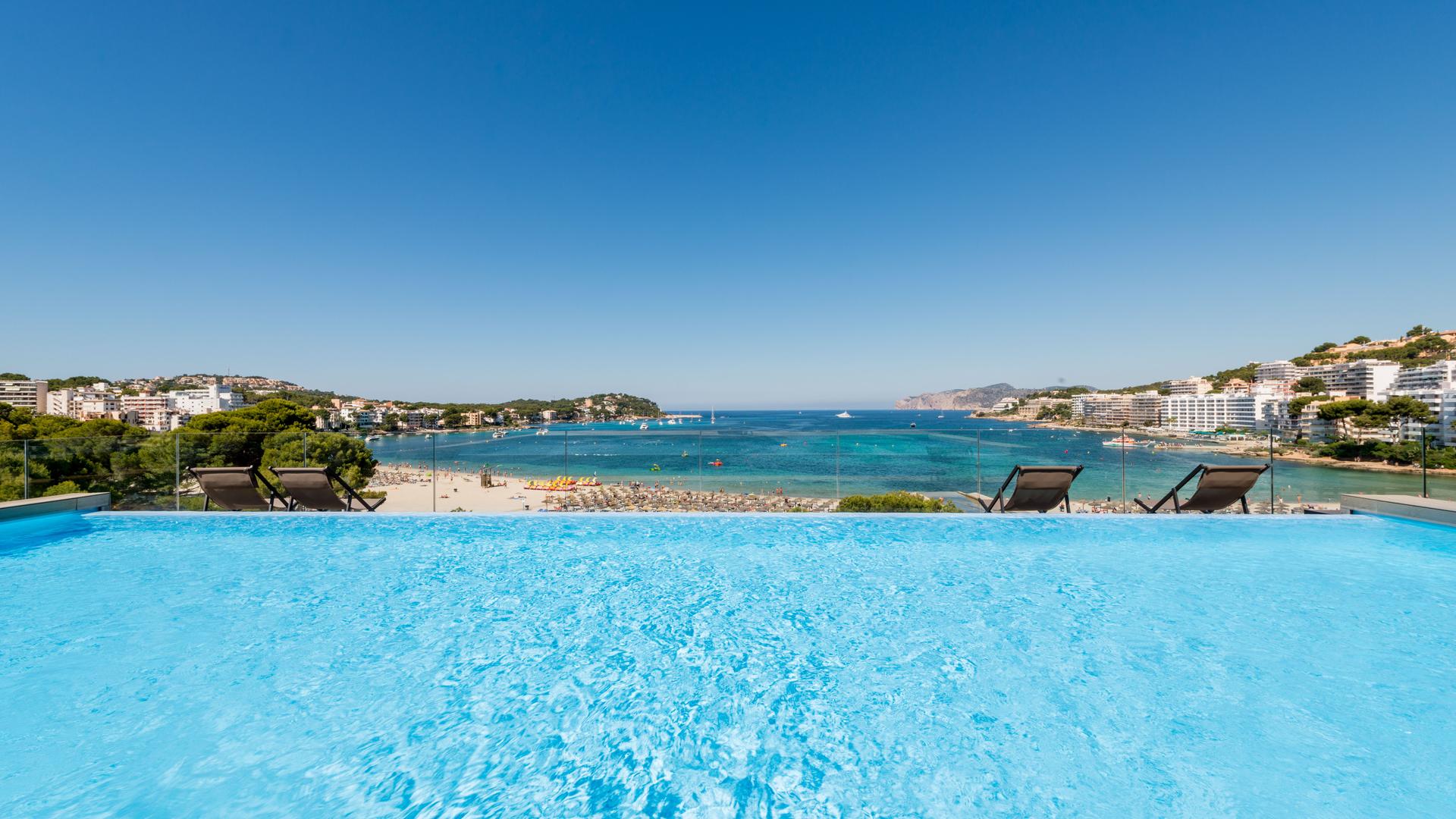 Infinity pool at H10 Casa del Mar overlooking Santa Ponsa Bay