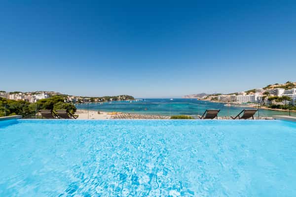 Infinity pool at H10 Casa del Mar overlooking Santa Ponsa Bay