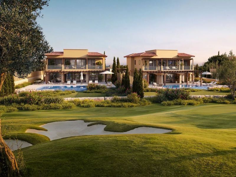 Two villas at Aphrodite Hills Resort, Cyprus, with modern design, private pools, and golf course views.
