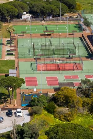 Aerial view of tennis courts and surroundings at Hilton Vilamoura As Cascatas Golf Resort & Spa in Portugal.