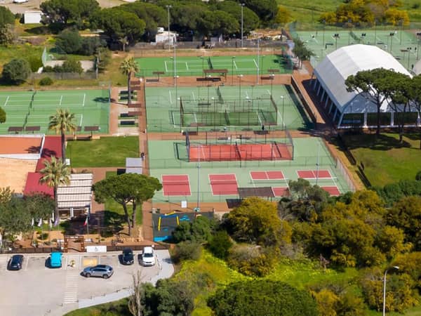 Aerial view of tennis courts and surroundings at Hilton Vilamoura As Cascatas Golf Resort & Spa in Portugal.