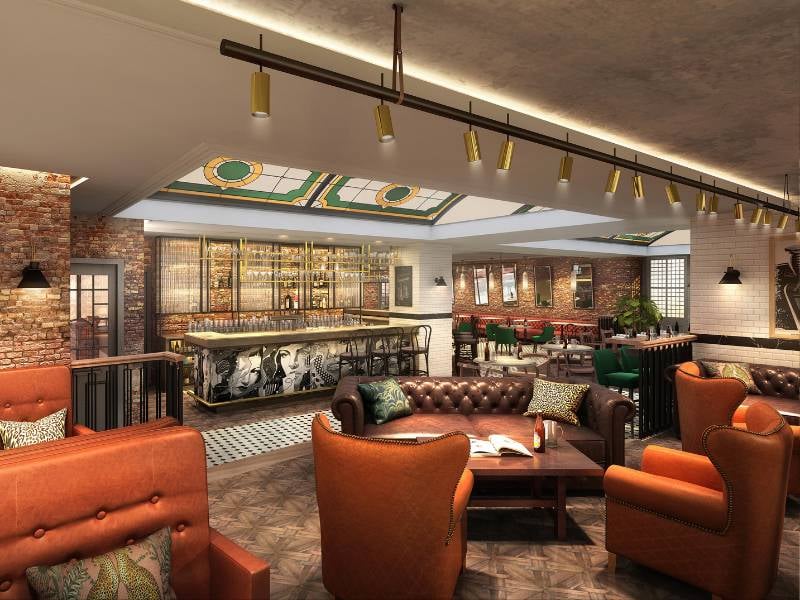 Interior of a trendy bar lounge with leather seating, modern bar, illuminated bottle shelves, and a mix of contemporary and classic design elements.