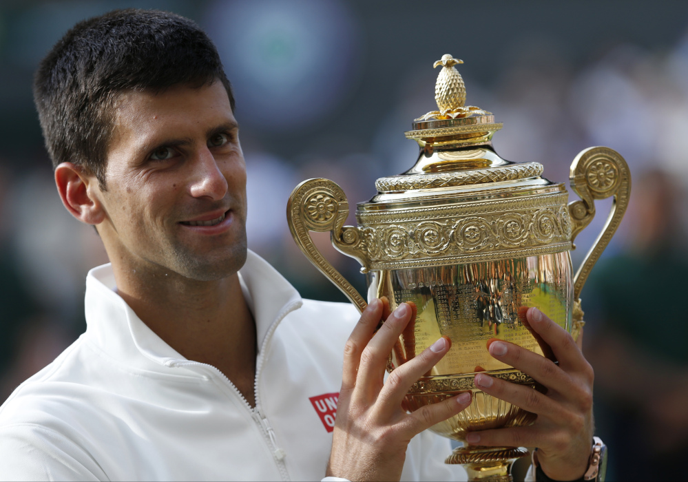 Novak Djokovic with the Wimbledon trophy
