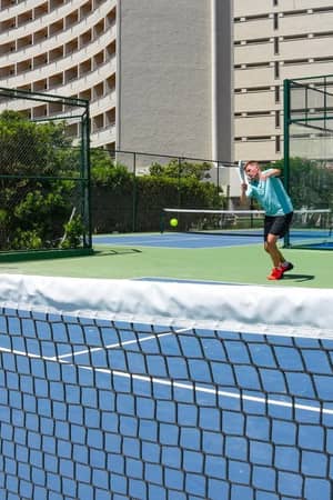 Pickleball coaching on an outdoor court at the hotel