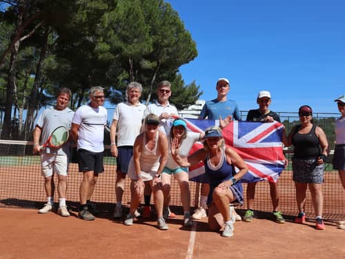 Active Away tennis guests together on clay courts in Mallorca