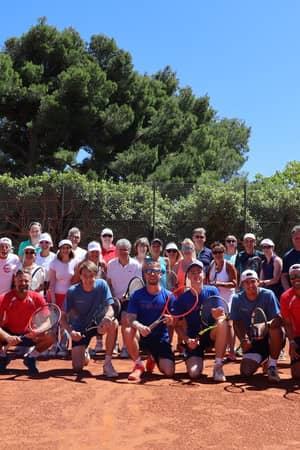 Beach Club Mallorca tennis holiday guests and coaches together on court