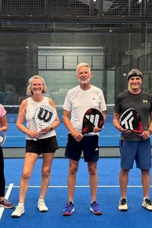 Adult padel players on court at Advantage Padel Nottingham
