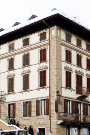 Hotel Monterosa exterior in Alagna surrounded by winter snow