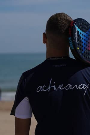 Active Away padel player beside Vilamoura Beach