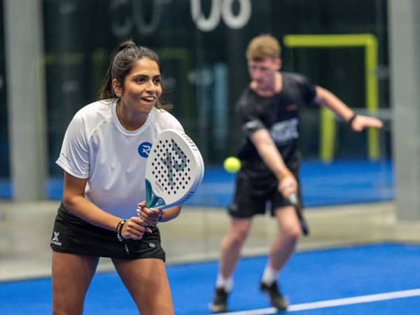 Padel players on court at Advantage Padel Mudeford
